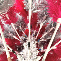 
              Pink and Silver Swirl Colored Artificial Christmas/Valentines Day Artificial Tree.
            